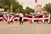 a group of people holding a flag