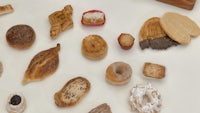 a variety of pastries are arranged on a table