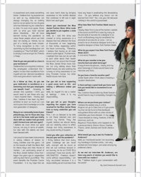 a magazine page with a woman in a green suit