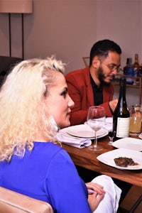 a group of people sitting at a table