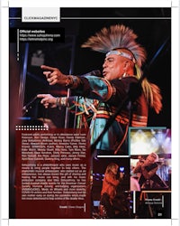 a magazine page with an image of a man in a feathered headdress