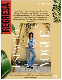 a magazine cover with a woman in jeans and a green plant