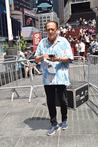 a man wearing a blue shirt