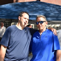 a man wearing a blue shirt