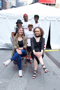 a group of people posing for a photo