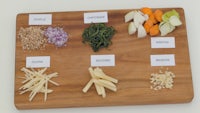 a cutting board with various ingredients on it