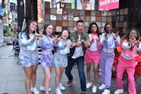 a group of young people posing for a picture