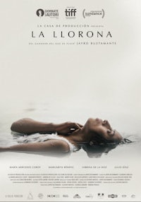 a poster for lallorona with a woman laying in the water