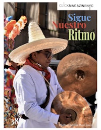 a mexican man wearing a sombrero and drums