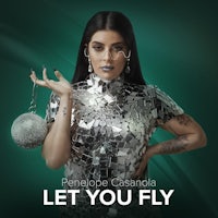 a woman holding a silver ball with the words let's let you fly