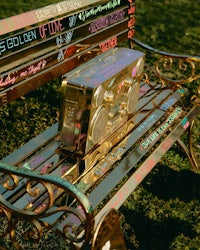 a bench with a boombox on it