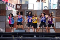 a group of dancers on a stage