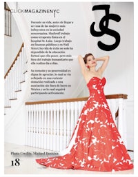 a woman in a red dress is posing on a staircase